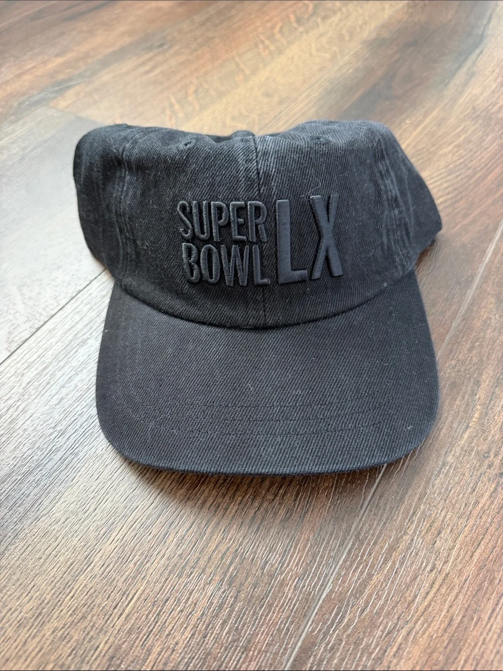 NFL Black Adjustable Hat with Embroidered Shield
